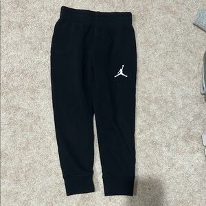Nike Kids Black Joggers with White Logo